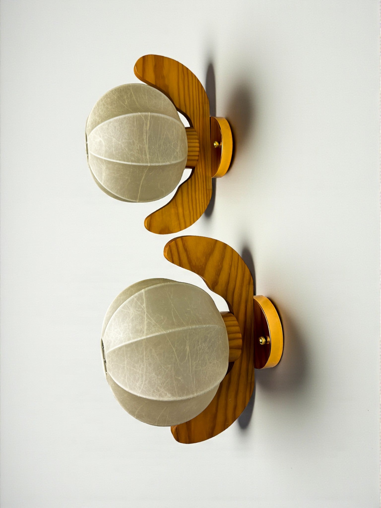 Pair of Italian "Cocoon" wall lights, resin and pine wood, Circa 1970