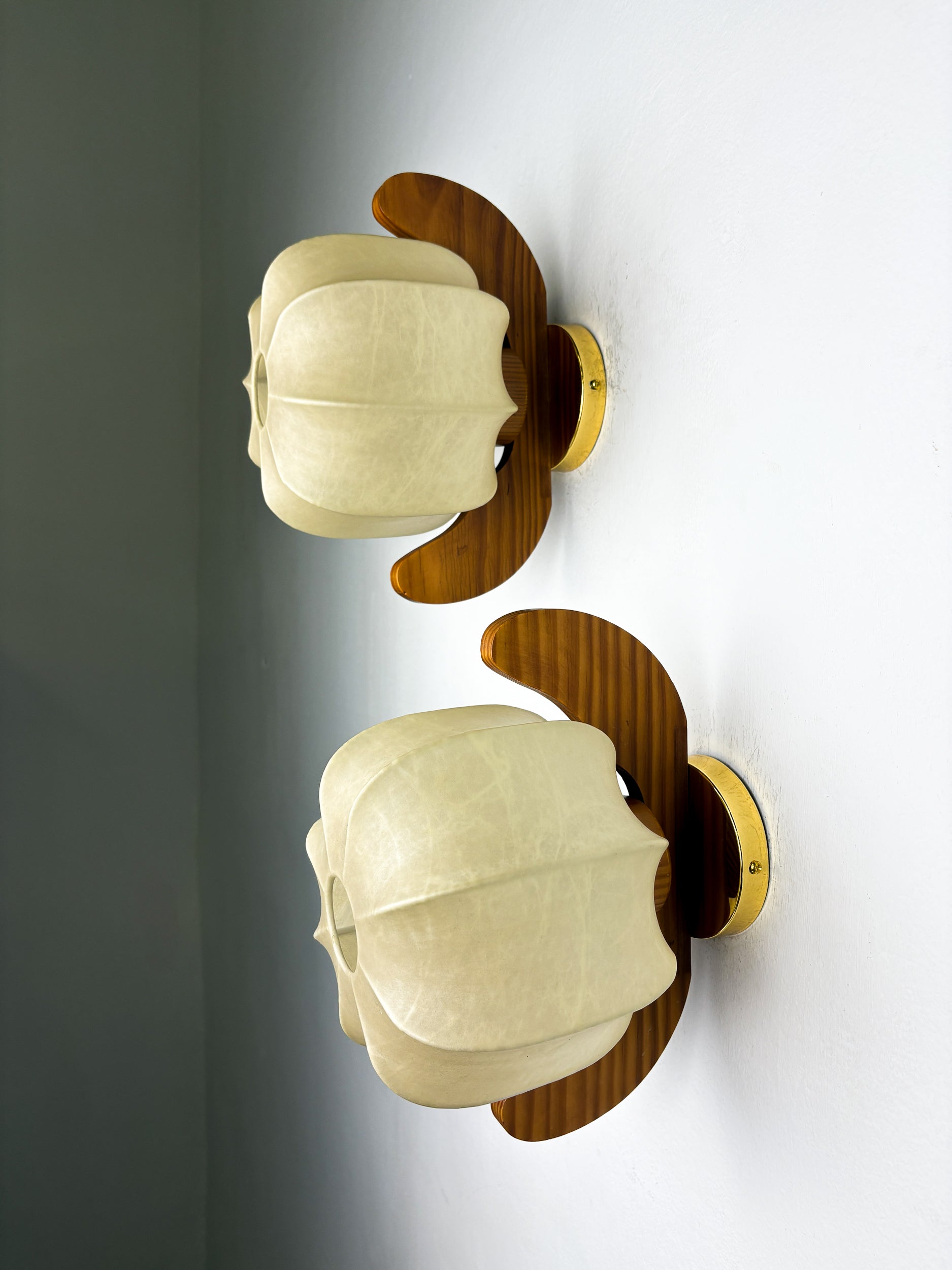 Pair of "Cocoon" wall lights, resin and pine wood, Italy, 1970's