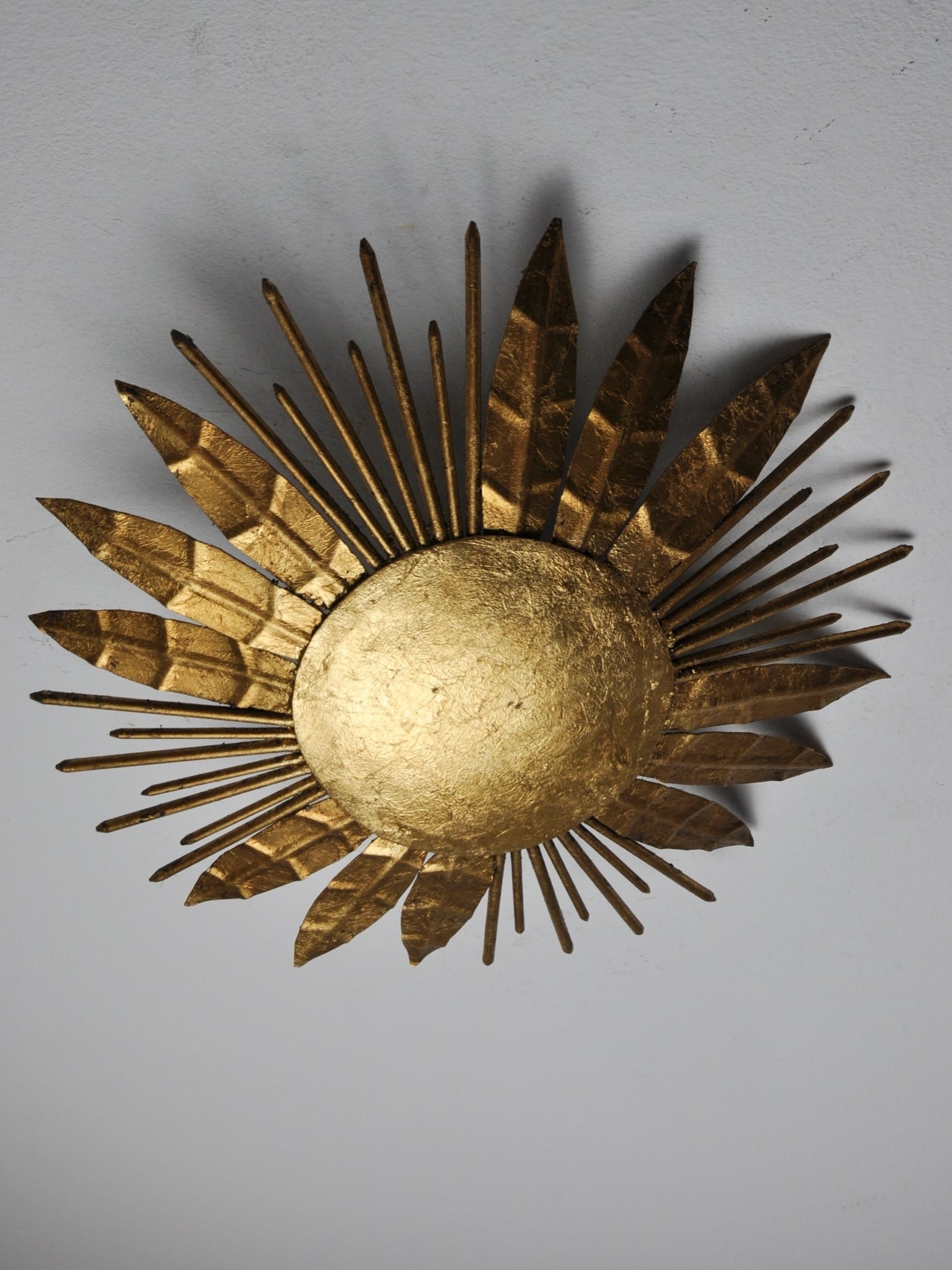 Brutalist sunburst flush mount light fixture, gold leaf gilded metal, Italy, 1970