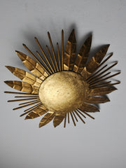 Brutalist sunburst flush mount light fixture, gold leaf gilded metal, Italy, 1970