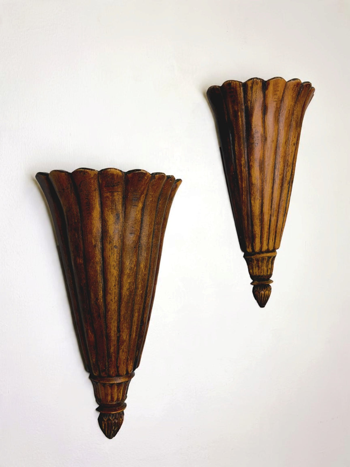 Pair of Art Deco carved wood wall sconces, France, 1930's