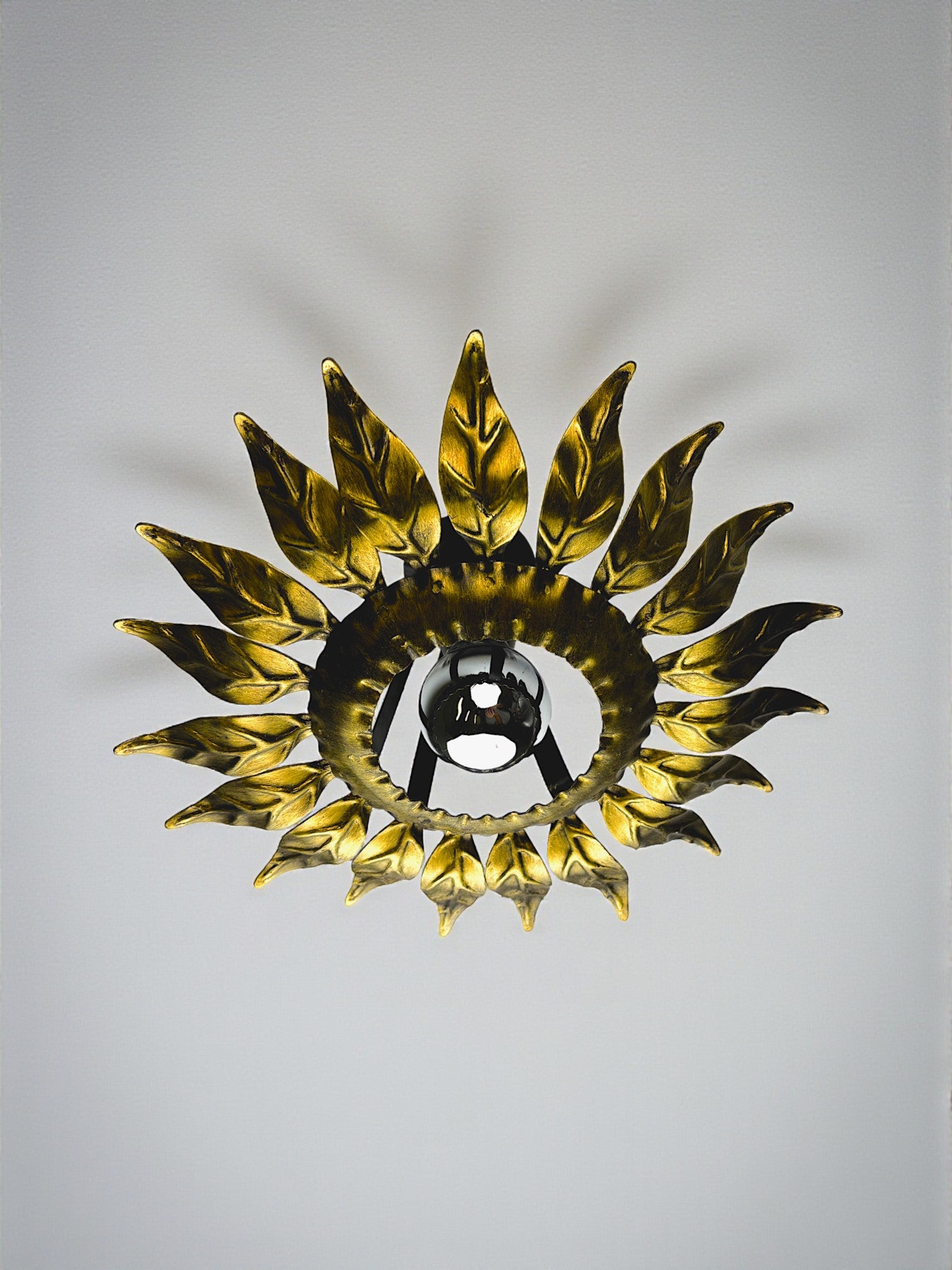 Sunburst ceiling light fixture or sconce in Gilt Wrought Iron, Spain, Circa 1960's