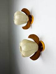 Pair of Pear-shaped "Cocoon" wall sconces, resin and pine wood, Italy, Circa 1970's