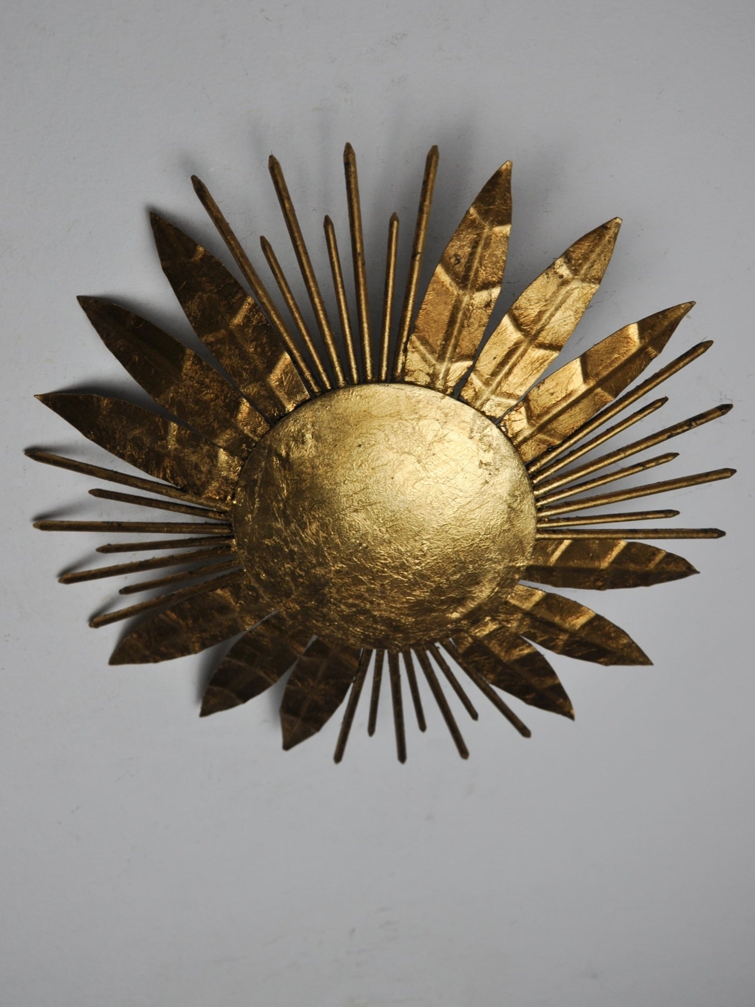Brutalist sunburst flush mount light fixture, gold leaf gilded metal, Italy, 1970