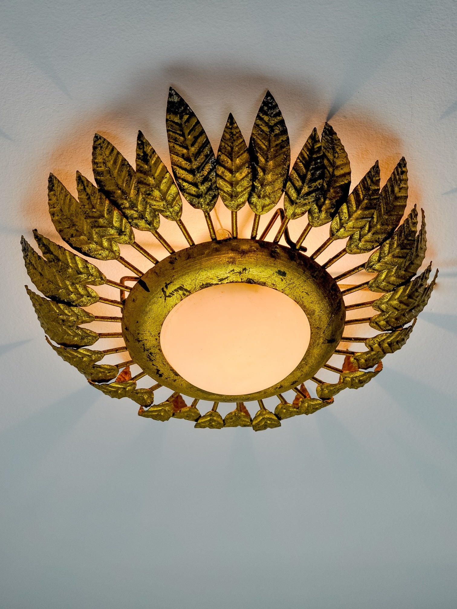 Sunburst Ceiling Lamp by Ferro Arte in Gold Leaf, Metal and Opaline Glass, Spain, 1960s