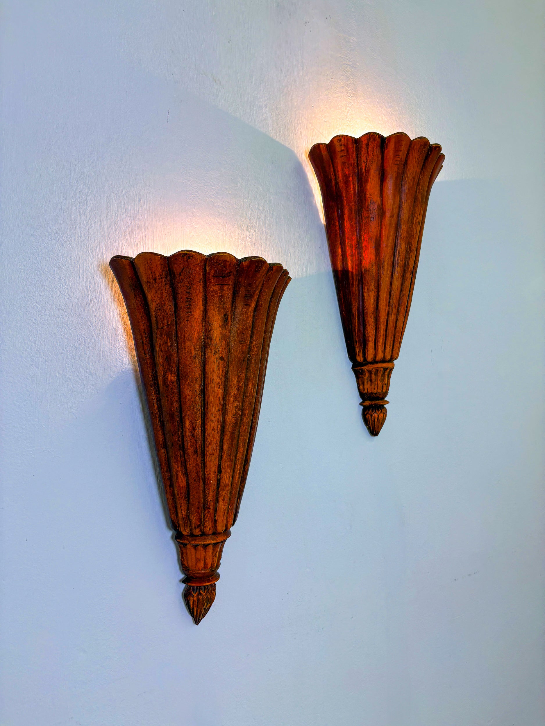 Pair of Art Deco carved wood wall sconces, France, 1930's