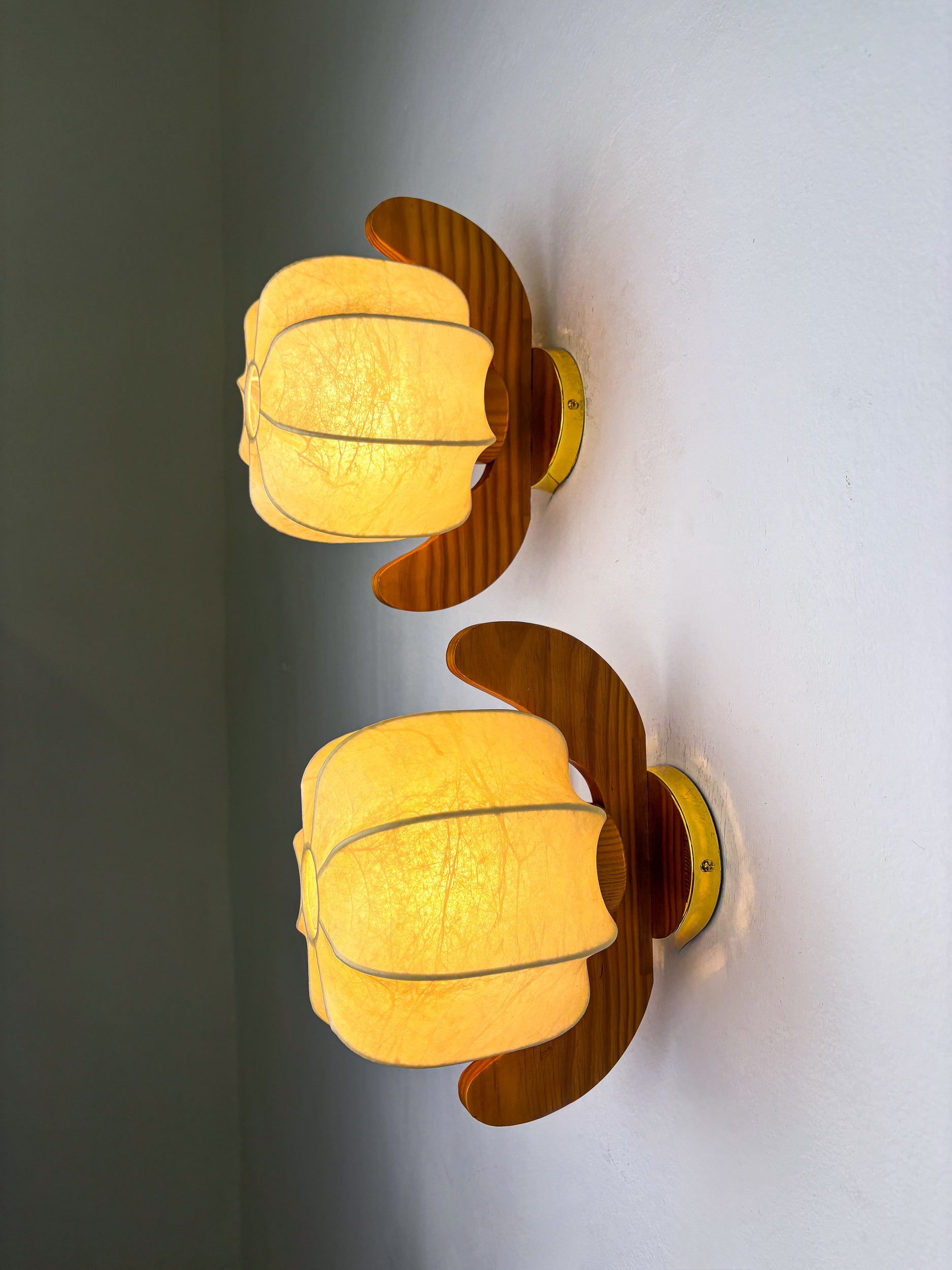 Pair of "Cocoon" wall lights, resin and pine wood, Italy, 1970's