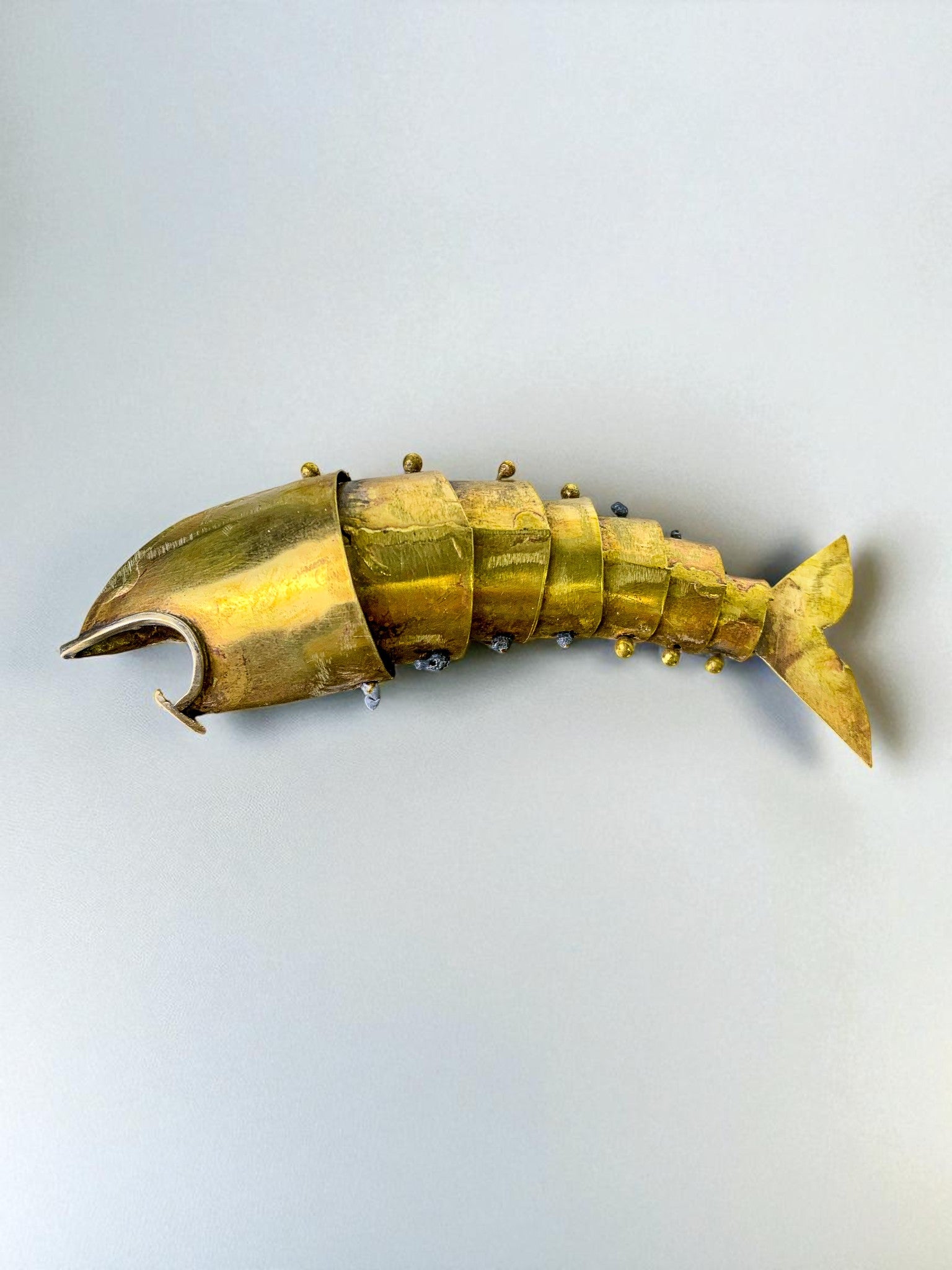 Brutalist articulated Fish bottle opener in brass, Mexico, Circa 1980's