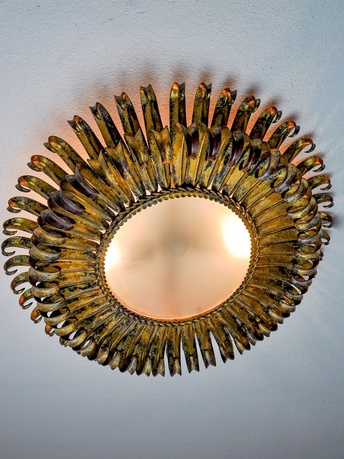 Spanish Sunburst Ceiling Light in Gilt Metal with Curled Floral Rays, 1960s