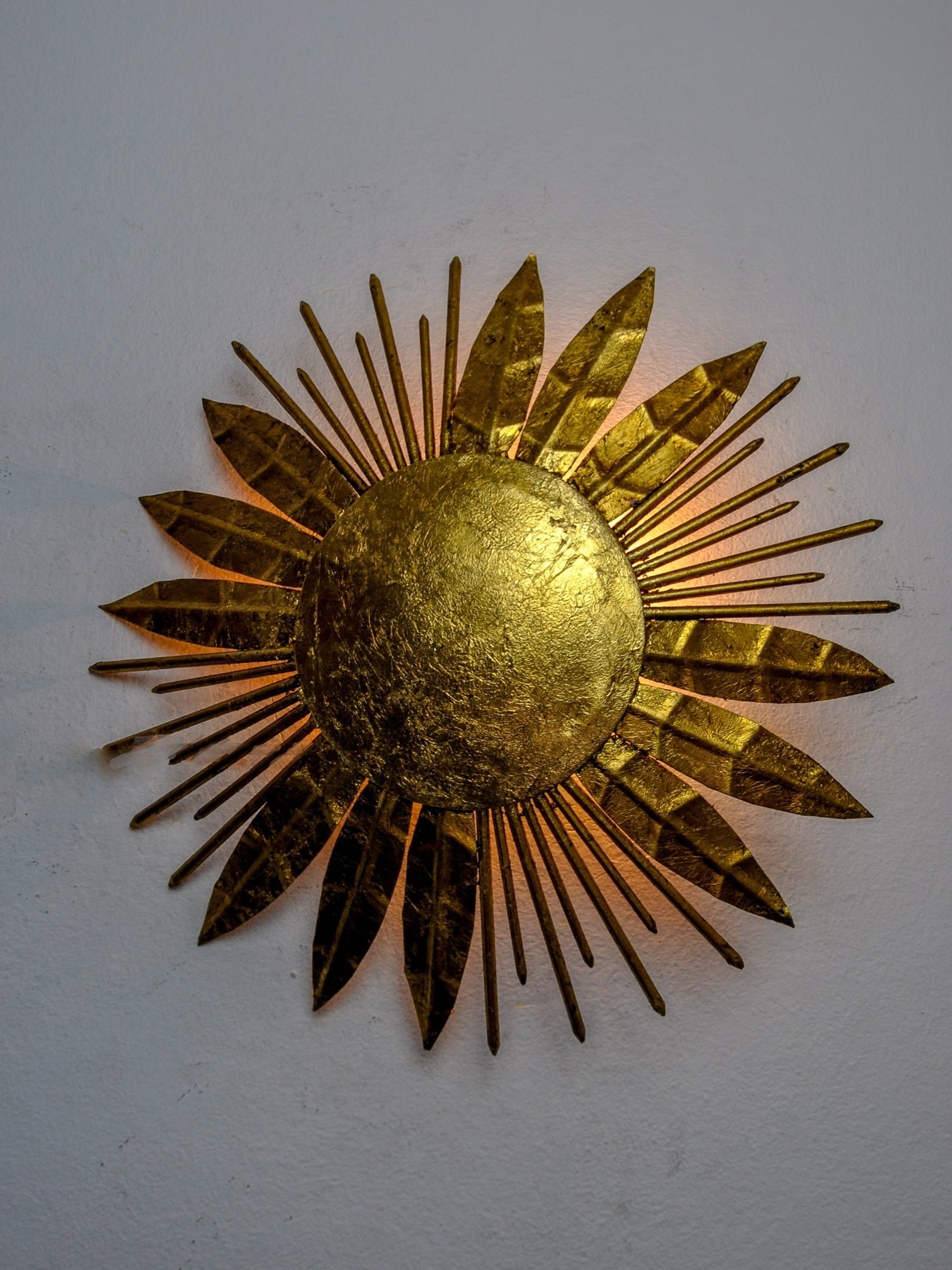 Brutalist sunburst flush mount light fixture, gold leaf gilded metal, Italy, 1970