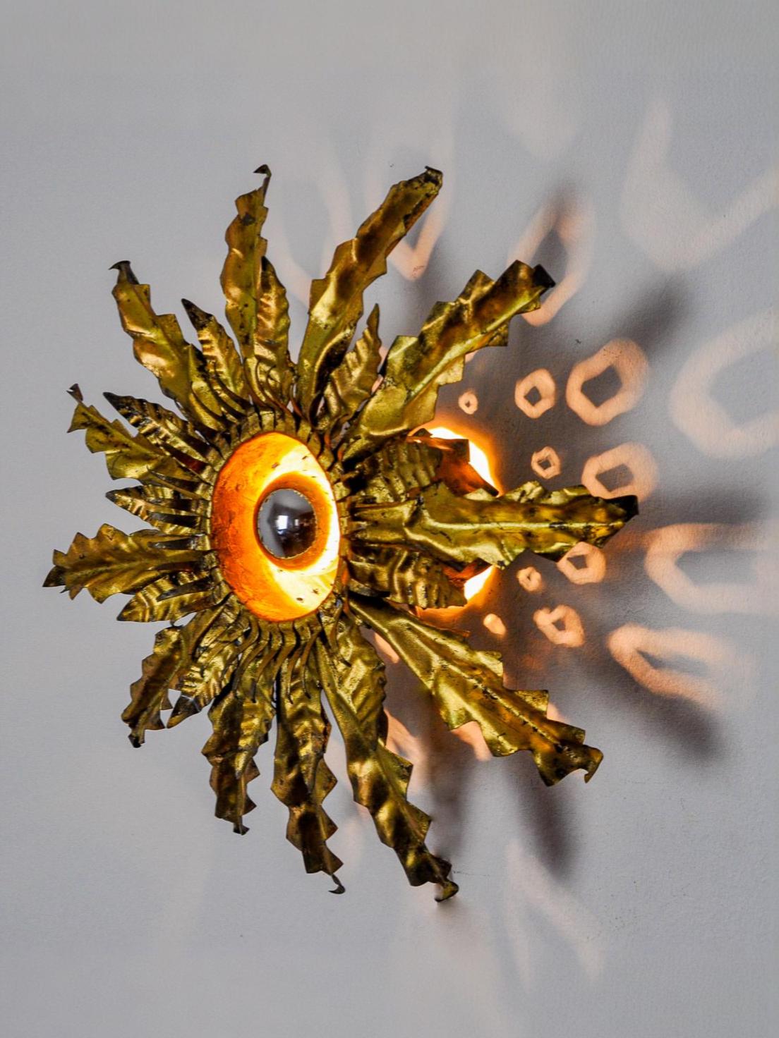Brutalist sun wall lamp, metal and gold leaf, Italy, 1960