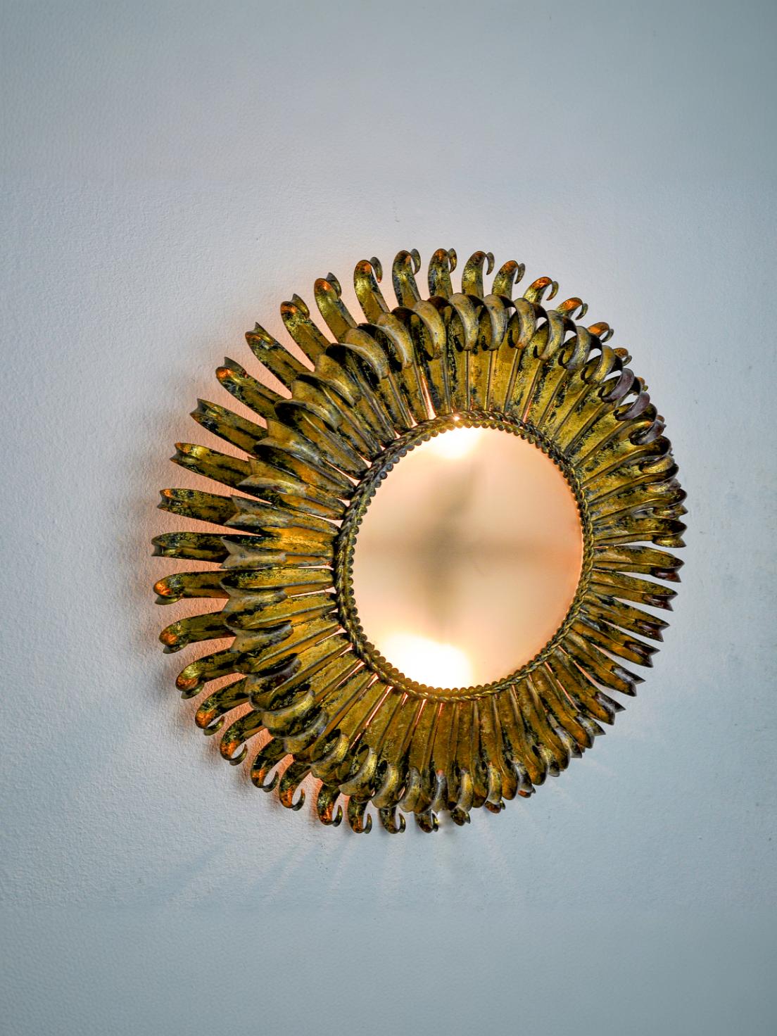 Sun wall lamp by ferro arte, metal and gold leaf, Spain, 1960