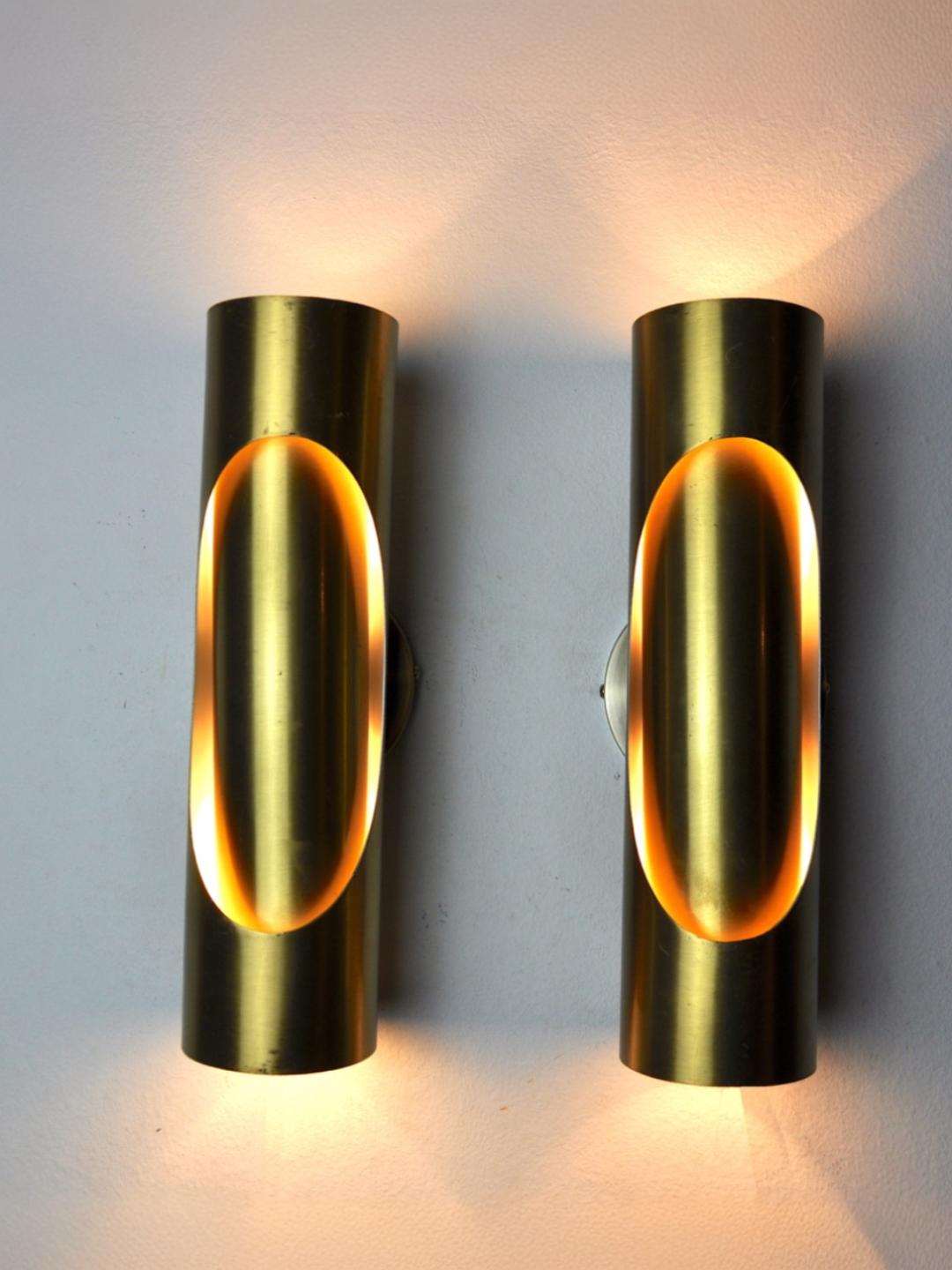 Pair of Raak tubular wall lamps in brass, 1970