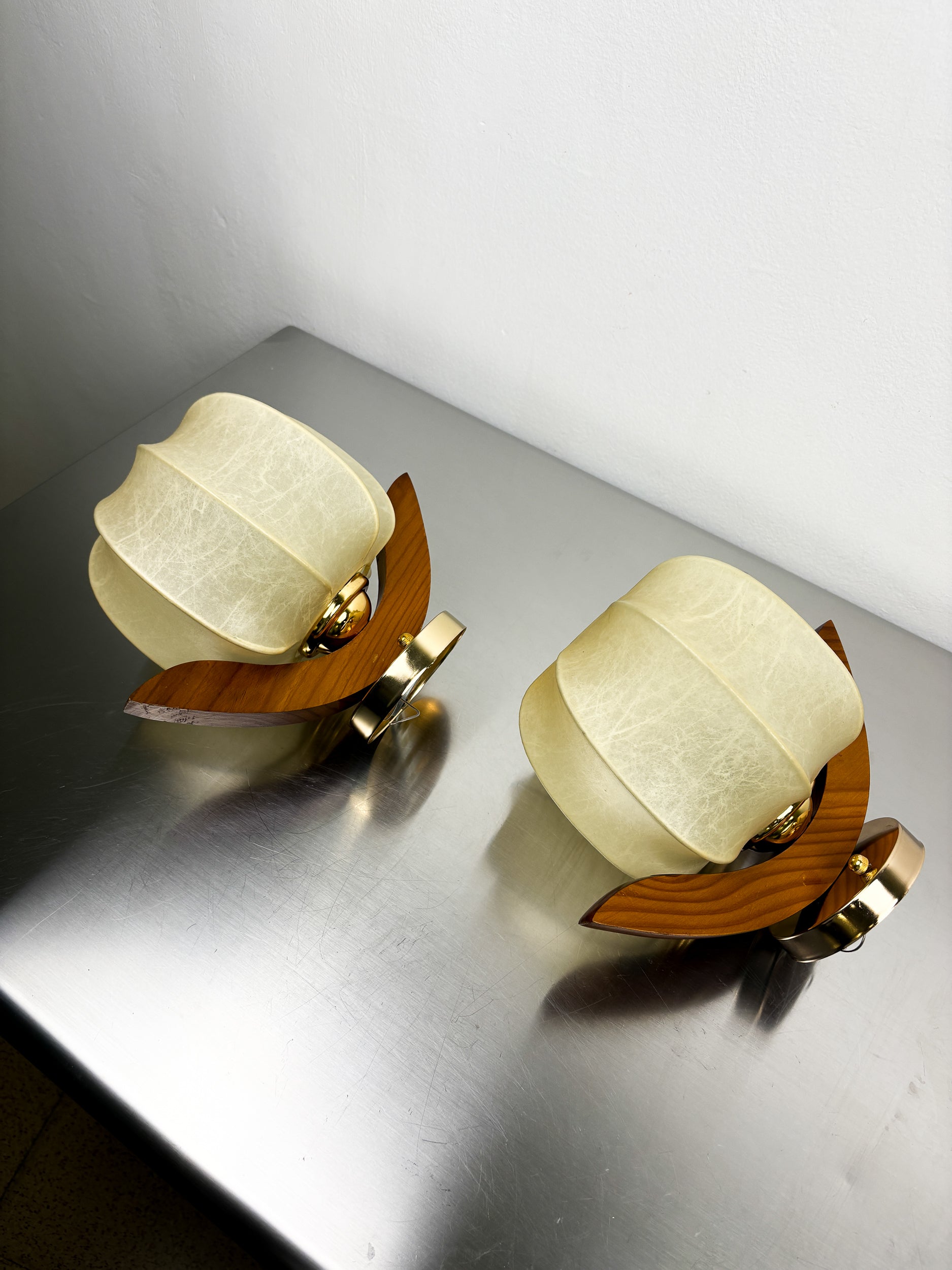Pair of Italian "Cocoon" wall lights, resin and pine wood, 1970s