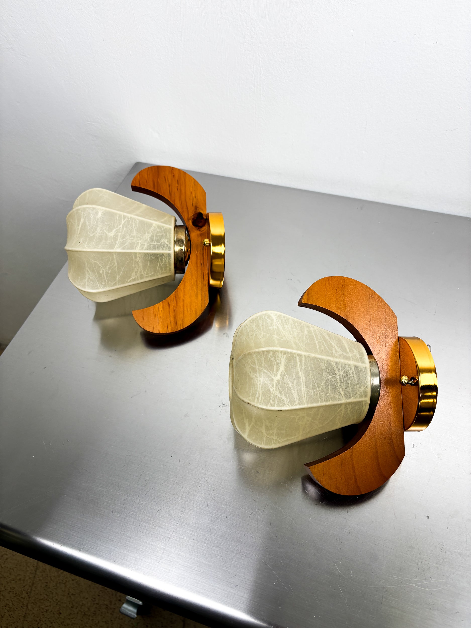 Pair of Pear-shaped "Cocoon" wall sconces, resin and pine wood, Italy, Circa 1970's
