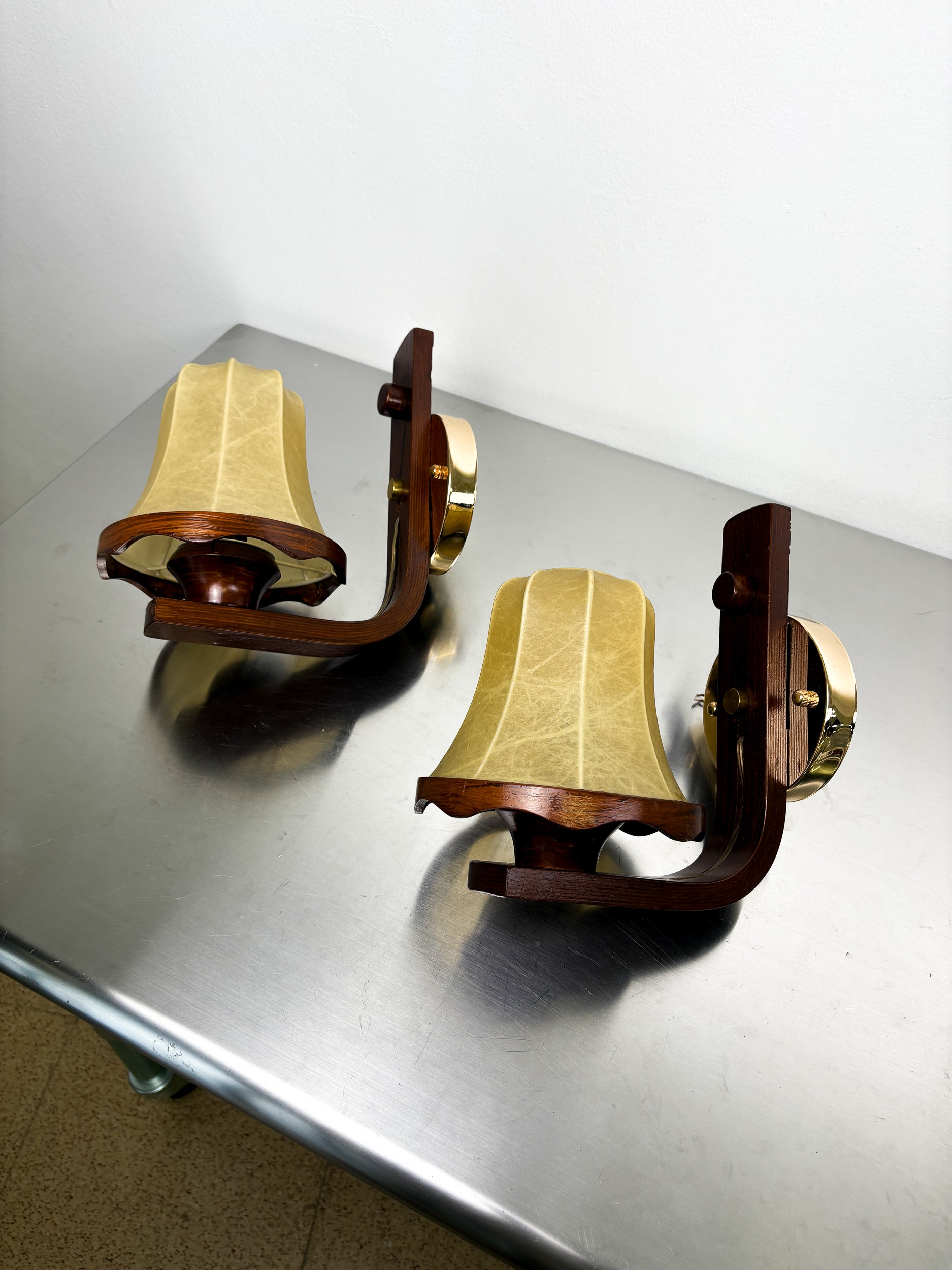 Pair of Italian "Cocoon" wall lights, resin and wood, 1970s