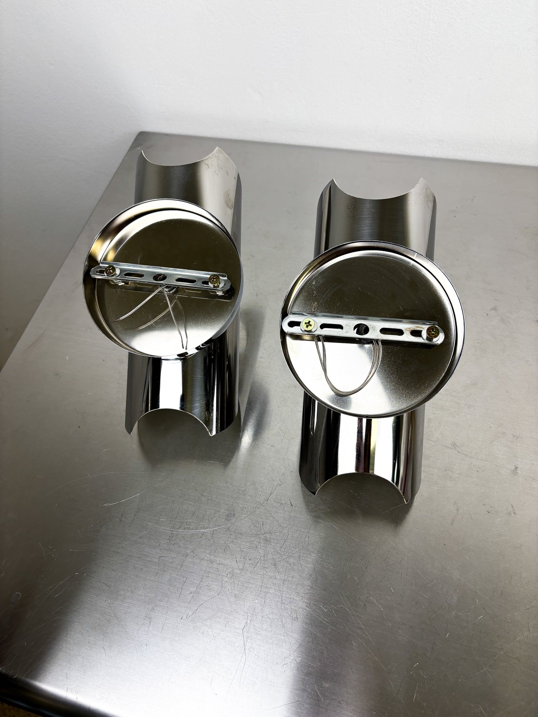 Pair of "folio" wall lights, space age, chromed metal, Italy, Circa 1970's